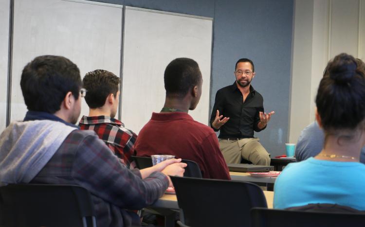 Man speaking to class