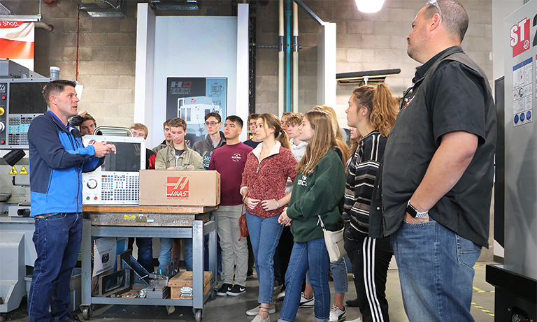 Group of students in machine shop